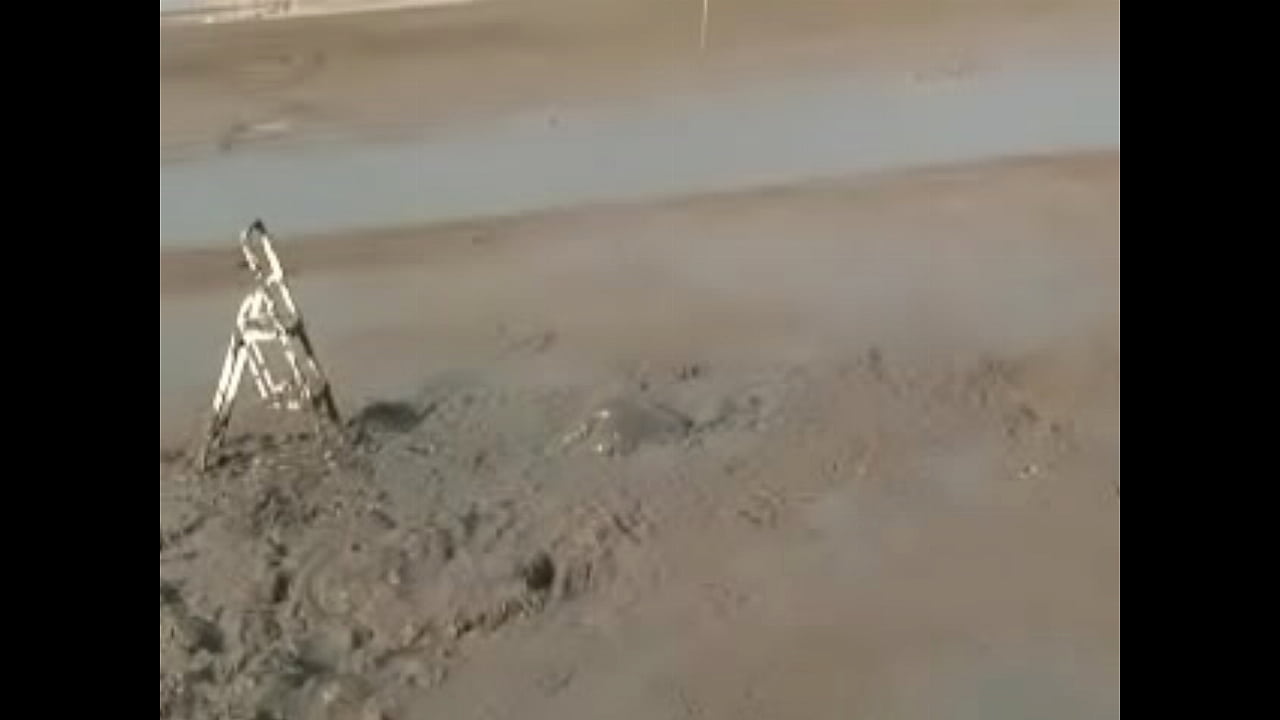 Girl Diving Headfirst Into Deep Mud