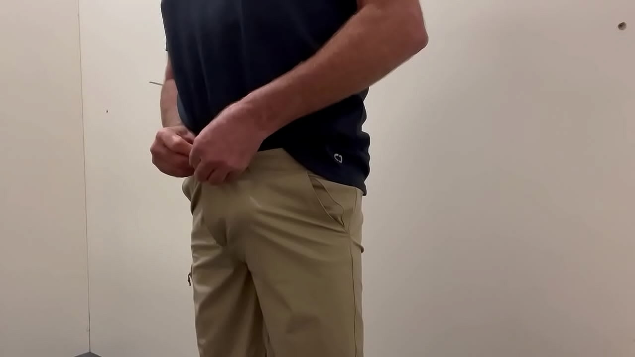 Trying on new pants at the department store