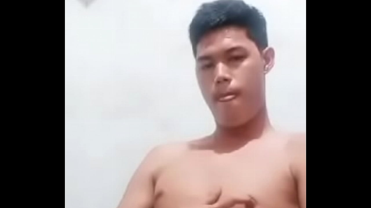 Asian guy masturbating