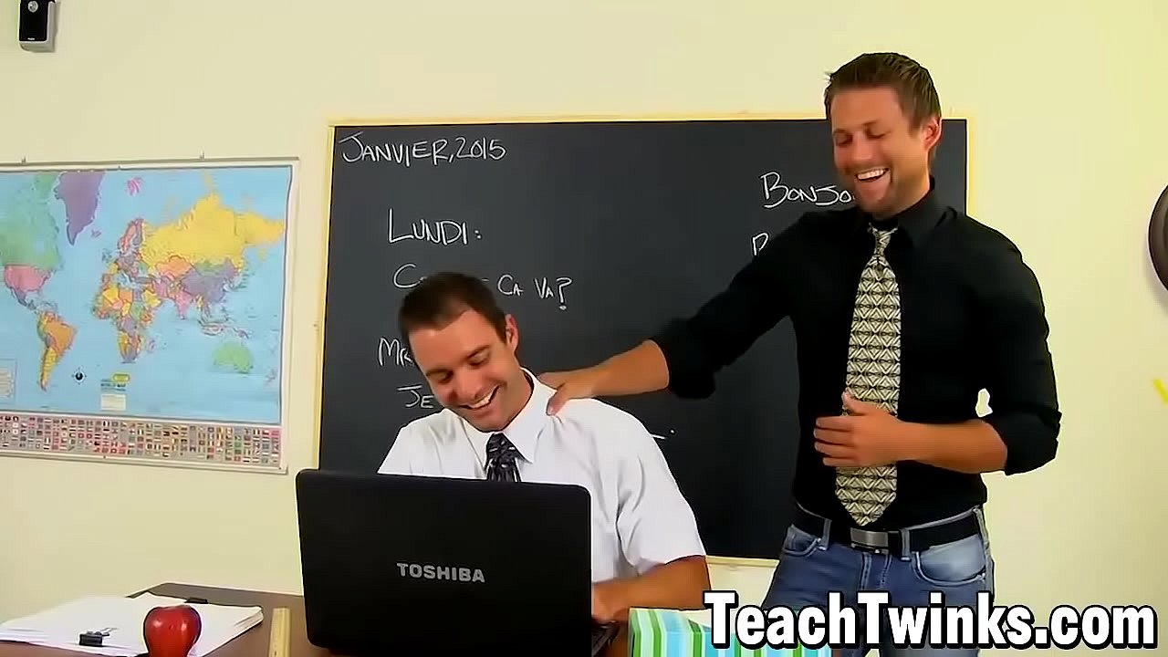 Two jocks have bareback fun in classroom