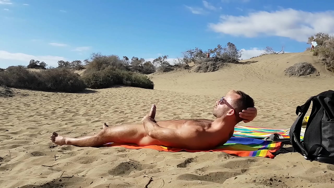 Playing with my huge cock in public in the dunes