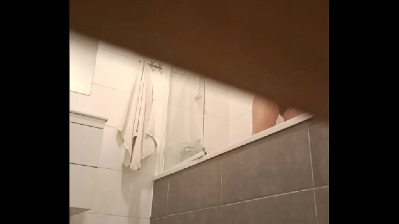 I let a girl living next door to take a shower at my apartment and secretly checked how is her pussy doing