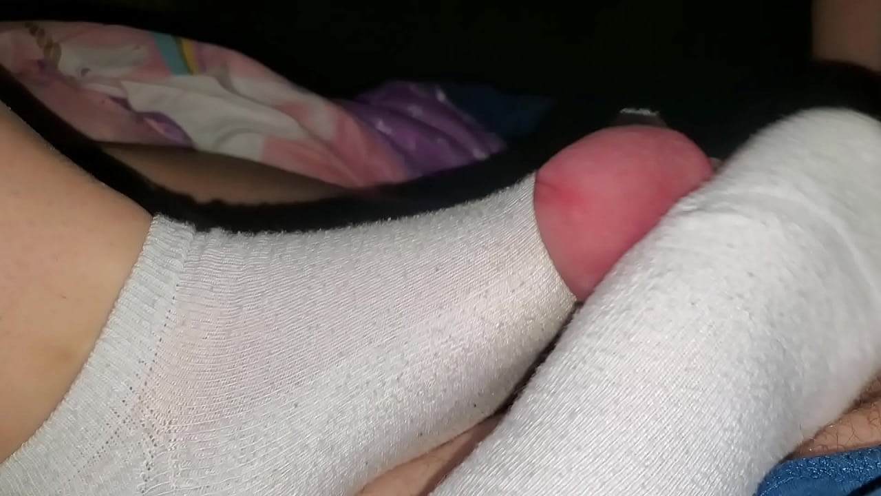 Socks on hard cock