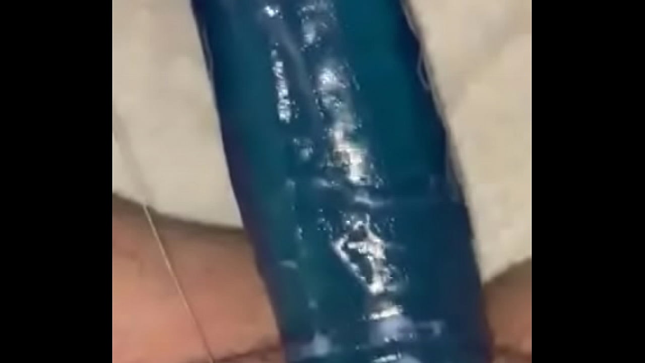 Wife fucks herself with big blue