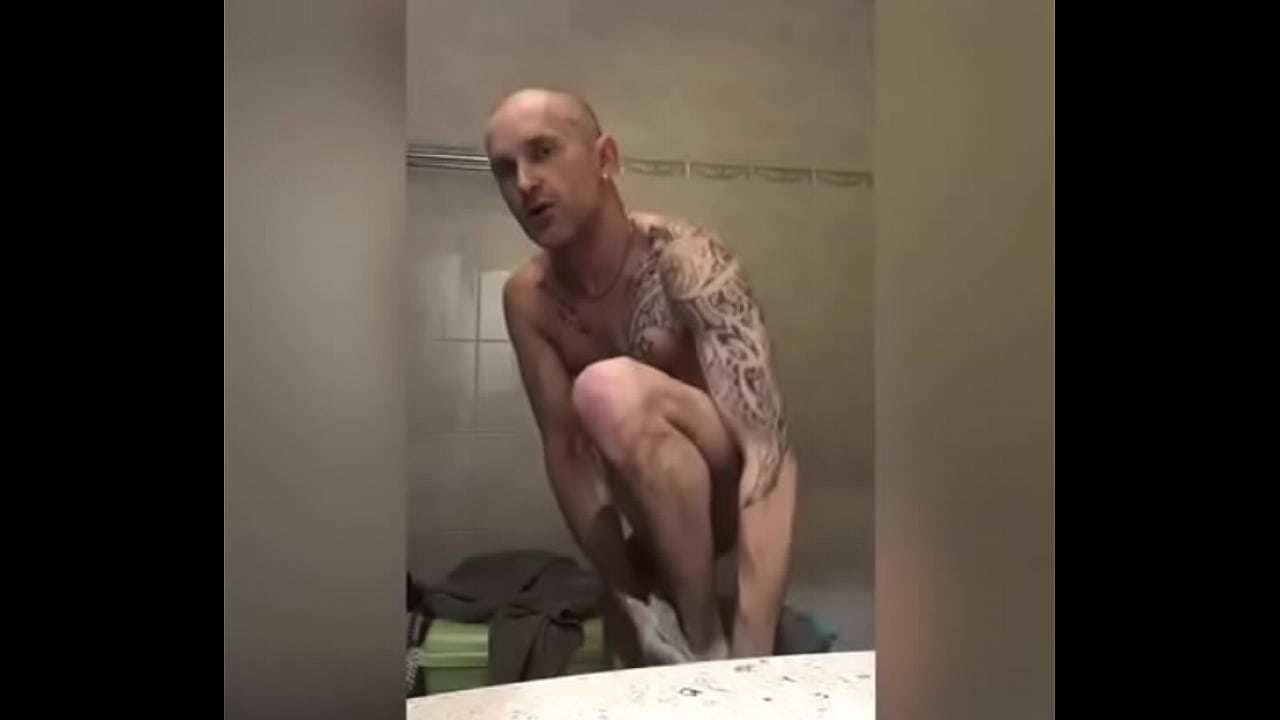 Tattoed dude showing his sexy body