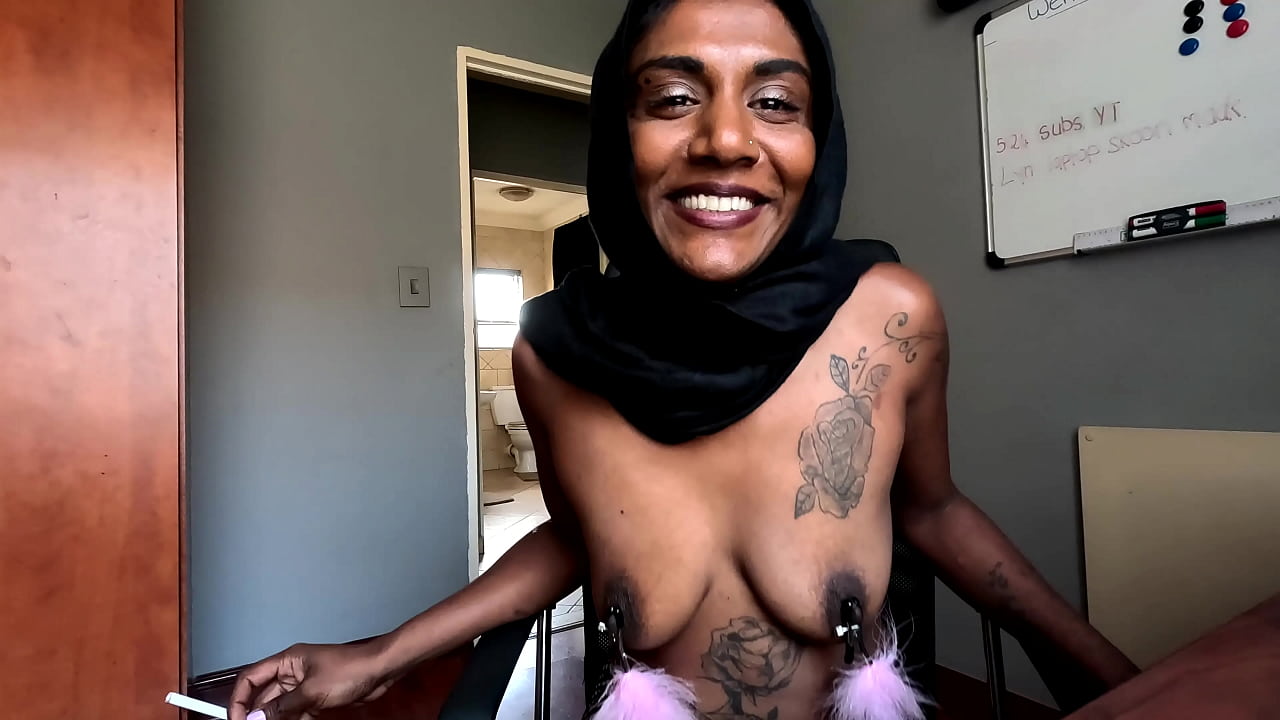 Desi in hijab smoking while wearing nipple clamps