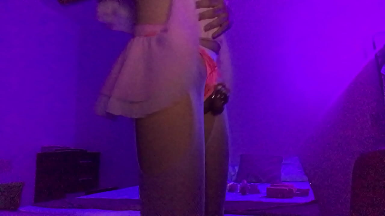 Scarlet Sissy dancing in chastity and with a butt plug