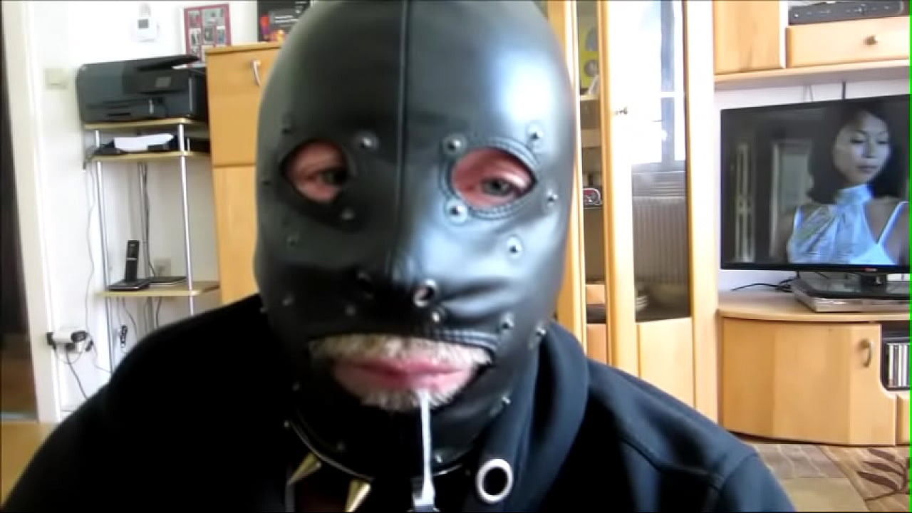 Naughty slave with leather mask swallows  sperm