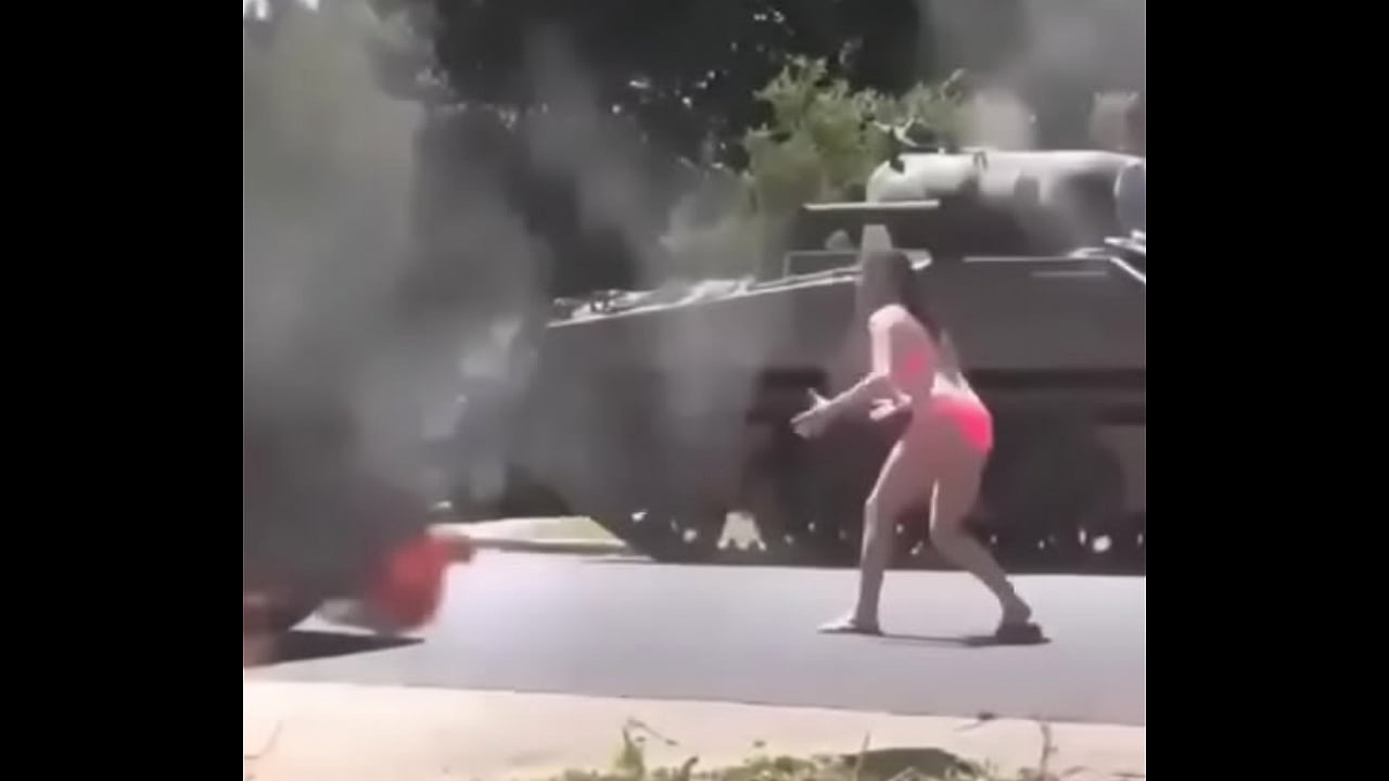 Guy smashes girl with tank