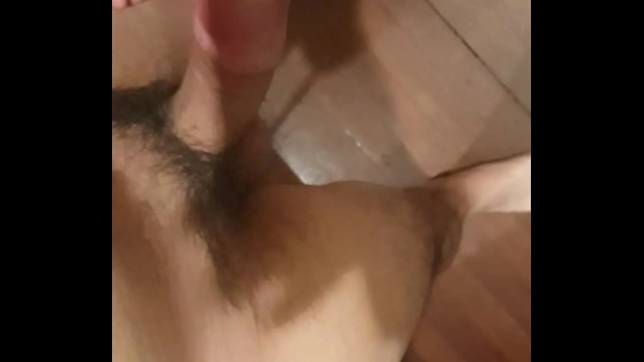 Jerking erect cock