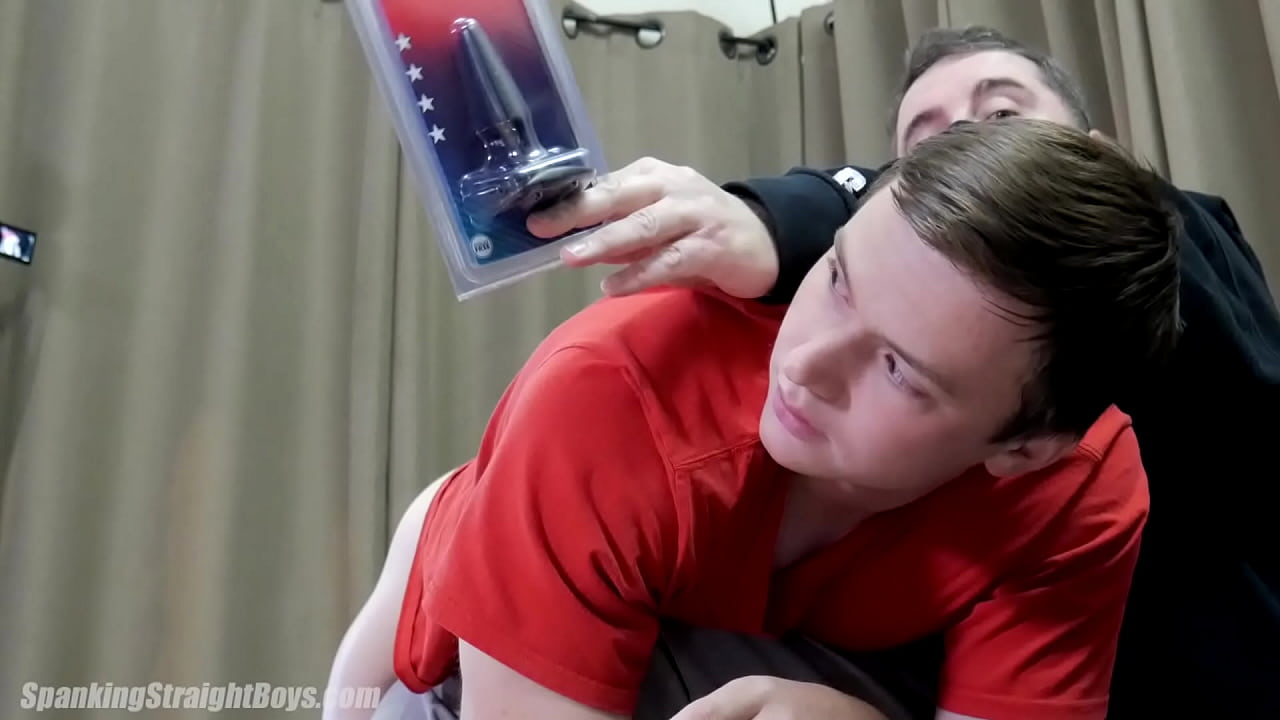 A Young Man is Spanked with a Butt Plug in his Ass