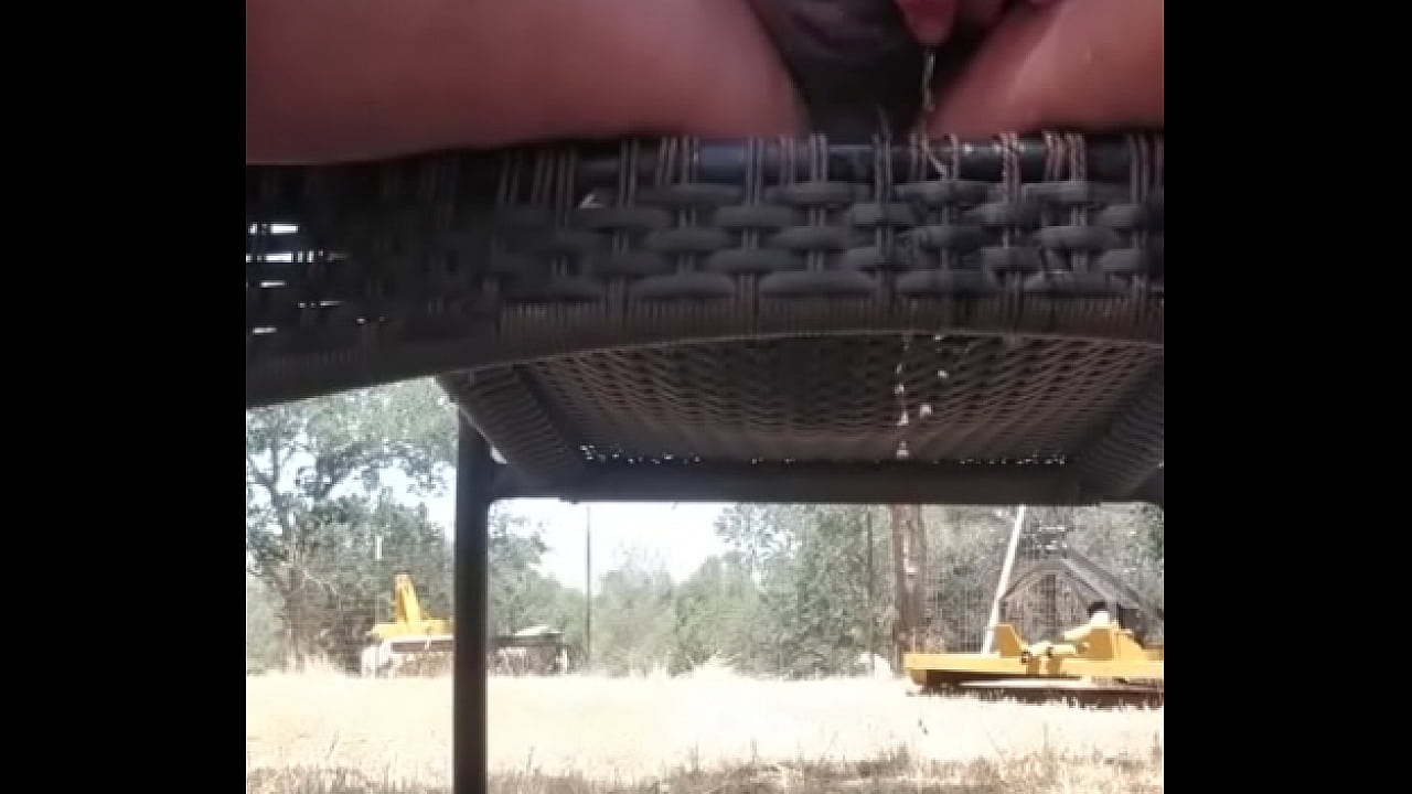 Grandpa tries to cool off behind the barn.