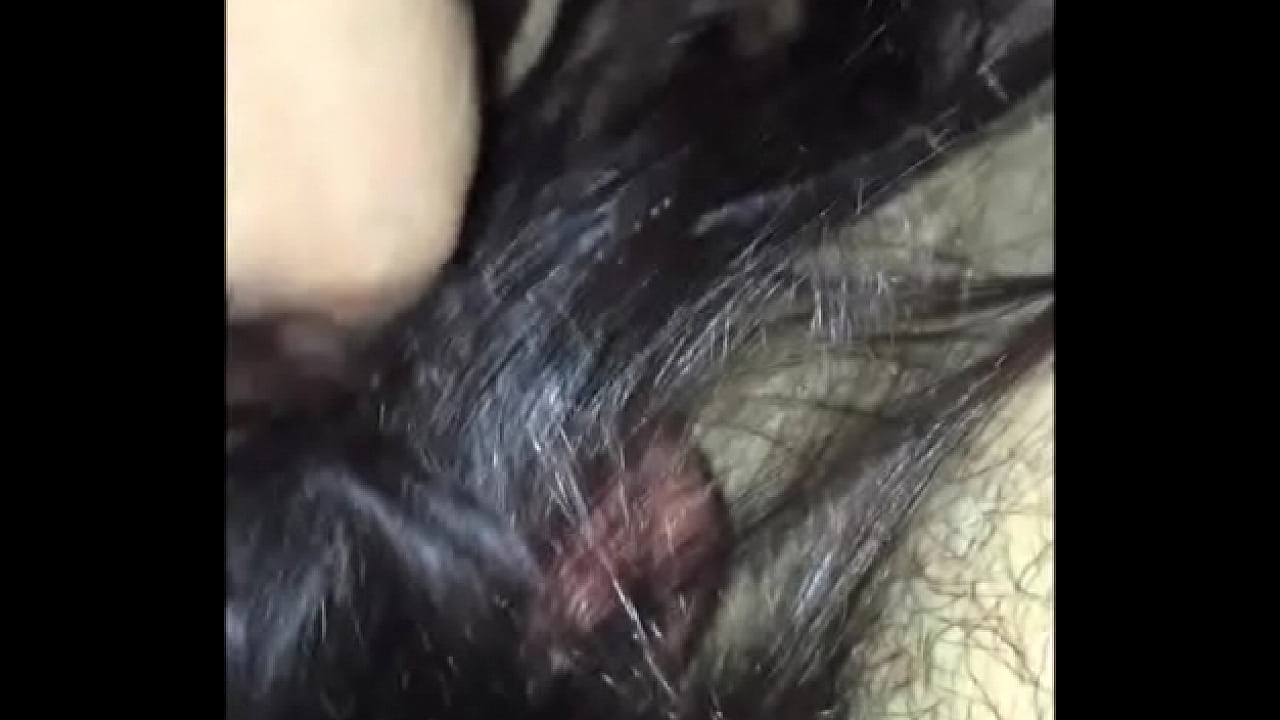 Brunette blowing a hairy cock to orgasm