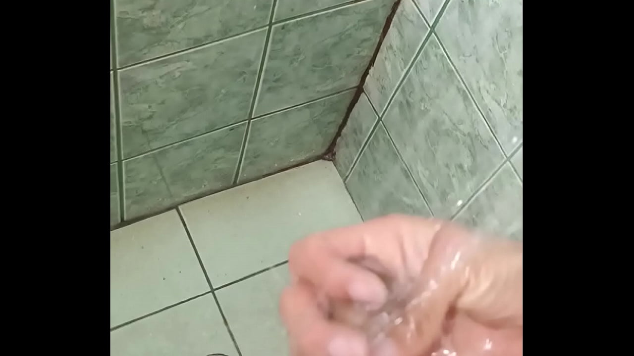 man in the shower ends up masturbating until he comes - watch the end