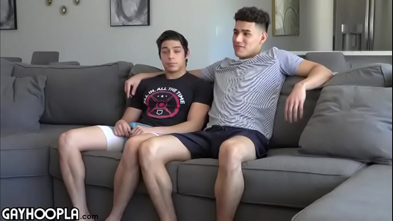 2 guys have fun on sofa