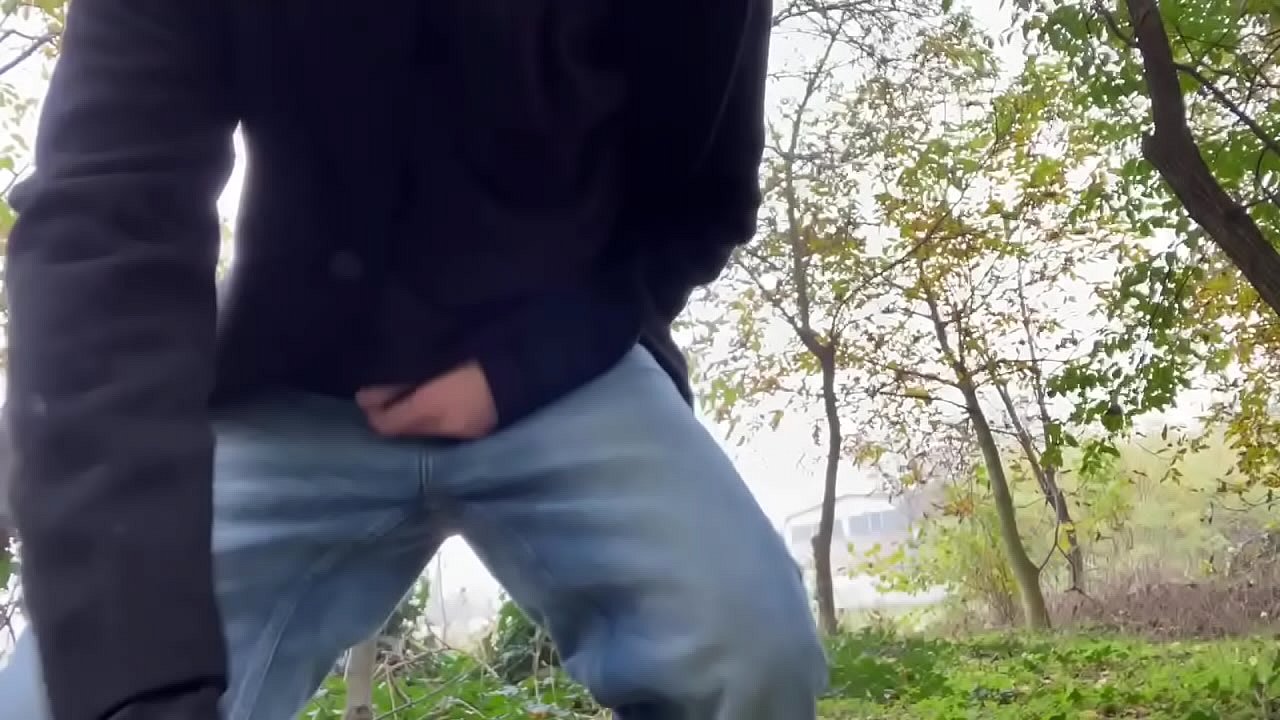 guy masturbates outdoors