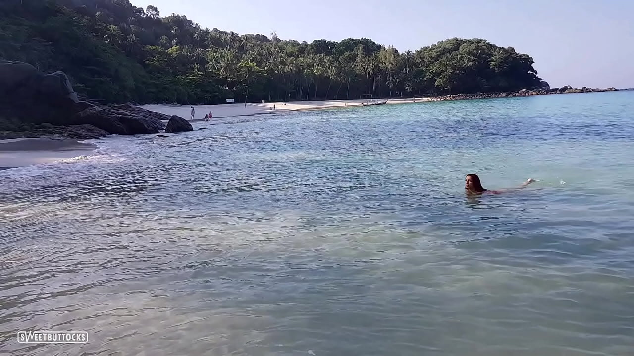 I swim without a swimsuit on the beach in Thailand