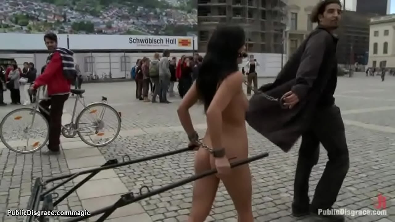 Naked Romanian slave Amabella gets wrists cuffed and chained together made to pull chariot in public square then fucked in the park by big dick Zenza Raggi