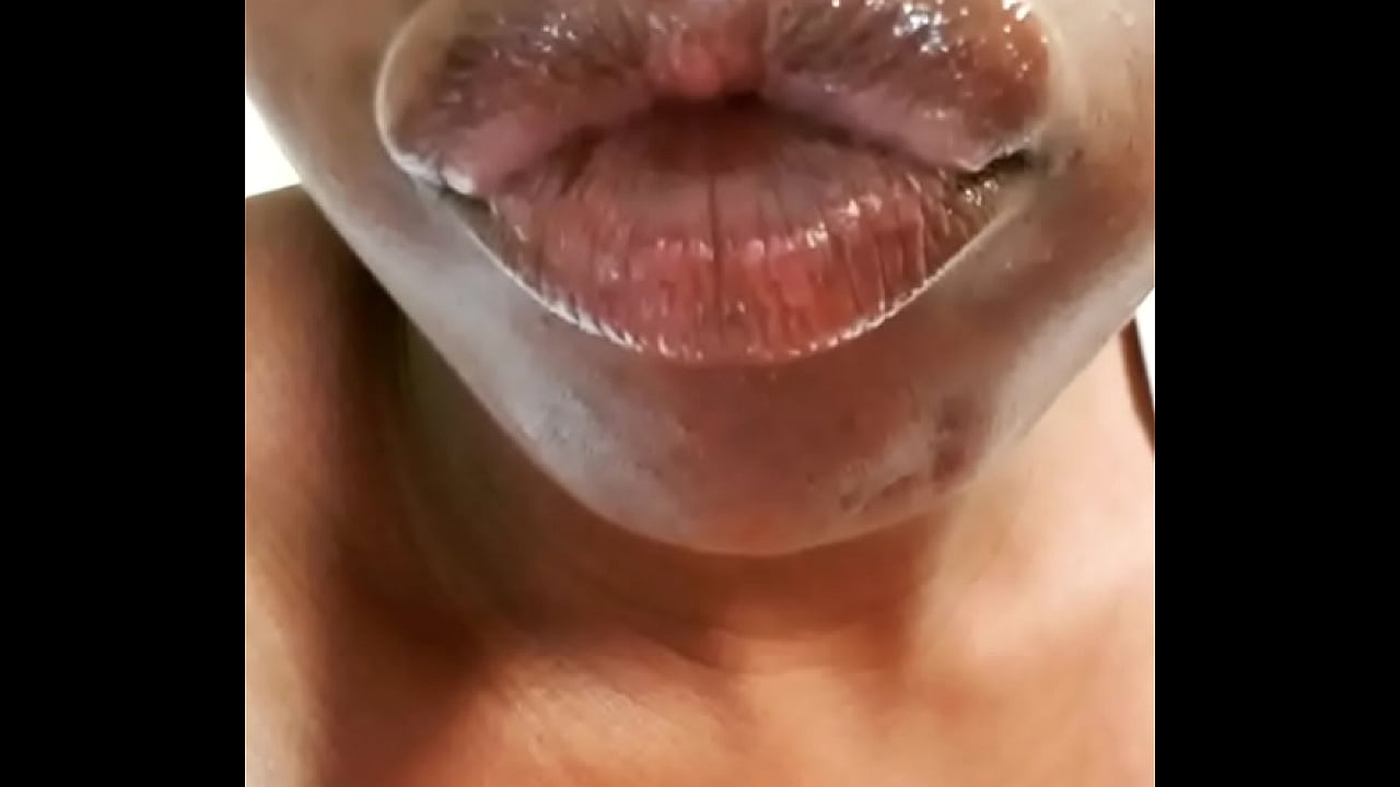 Ebony glossy lips on display