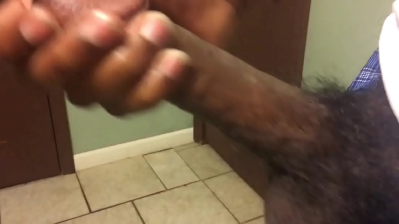 Young Black guy jerks cock