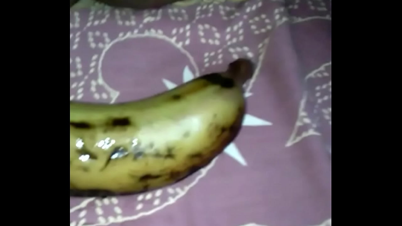 Tamil girl play with banana