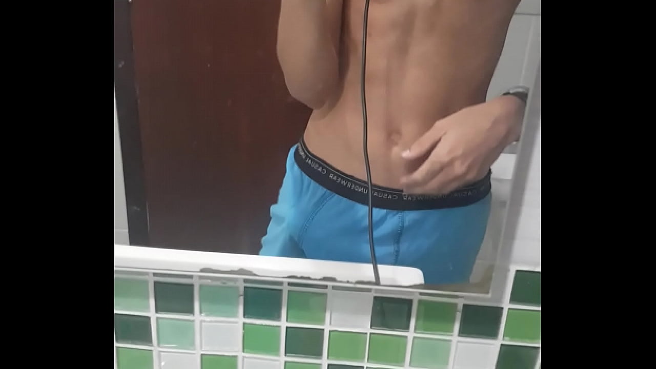 Teen with his hard dick on his underwear