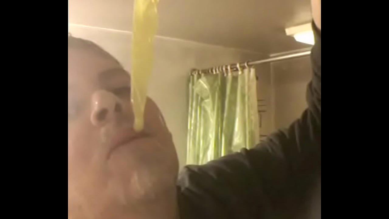 Faggot eats cum filled condom