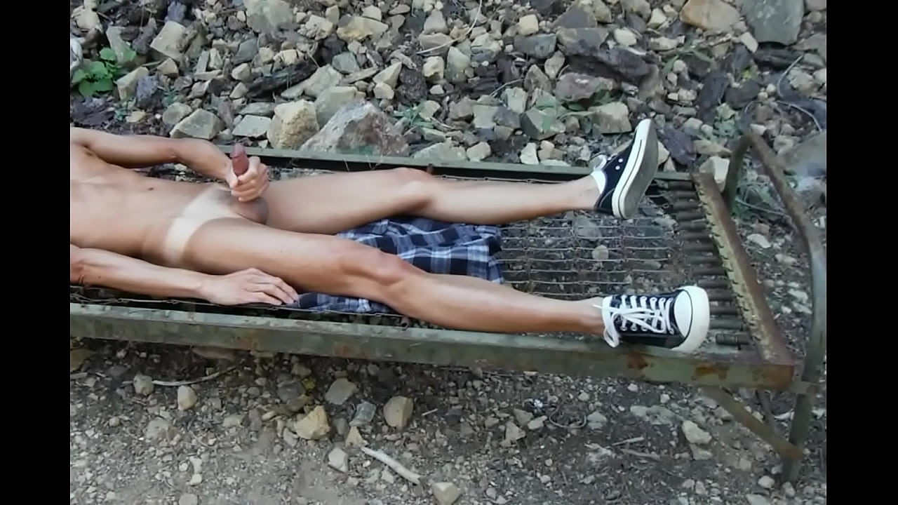 Outdoor wanking on a bedframe