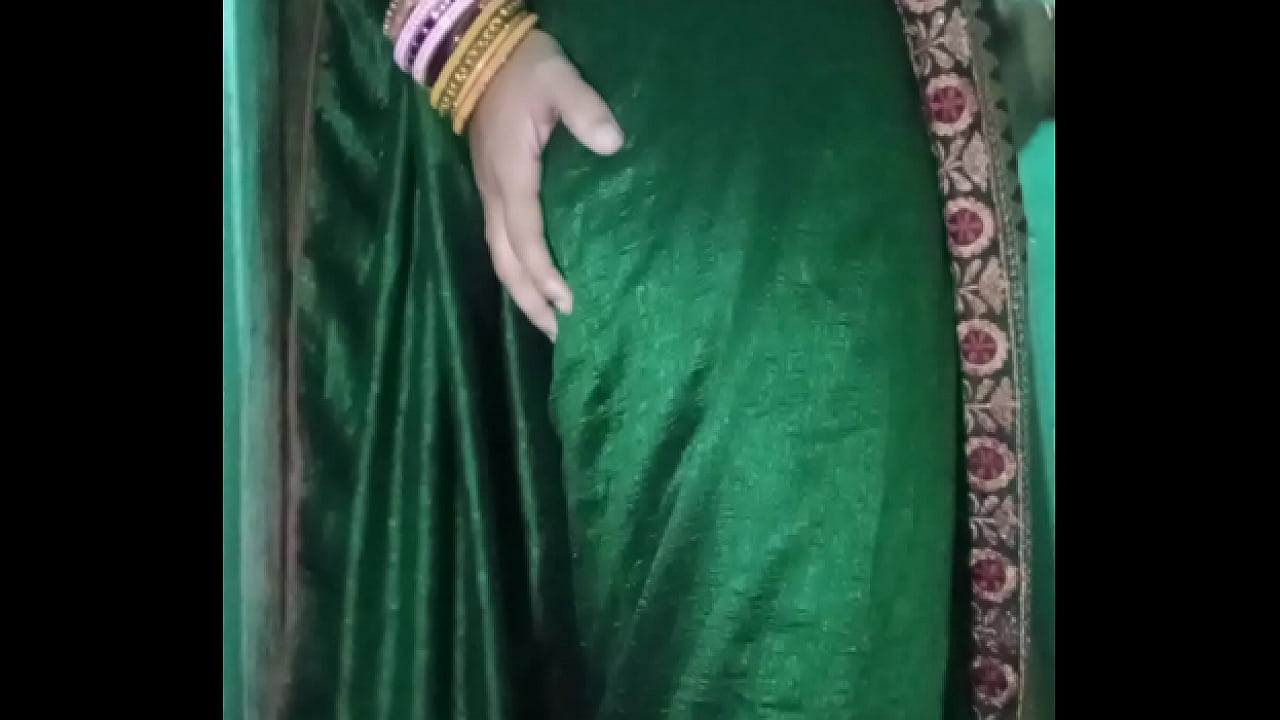 Indian sissy removing green saree