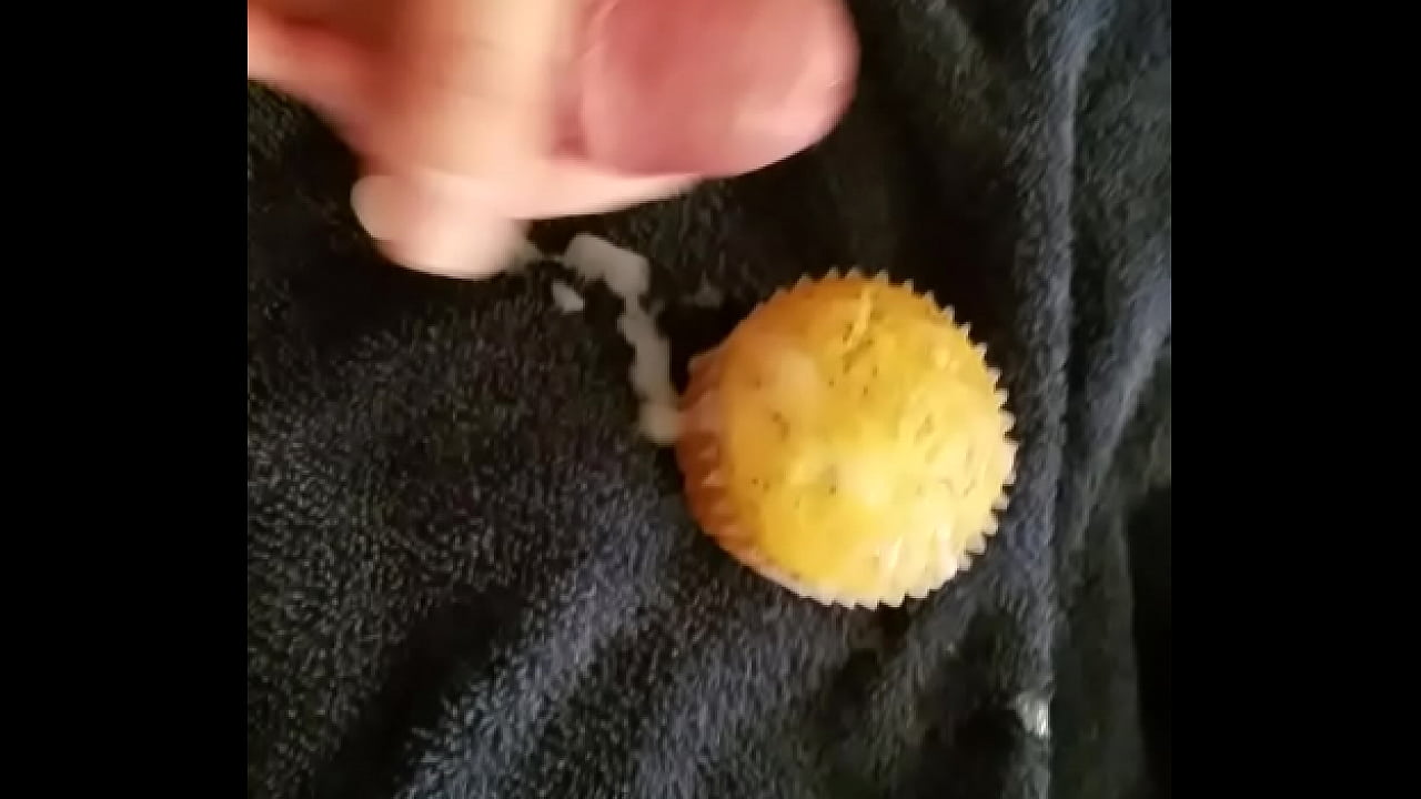 Dick Tracy Senior frosts a cupcake with cum