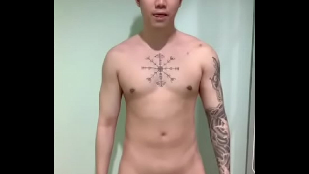 Cute asian boy show off