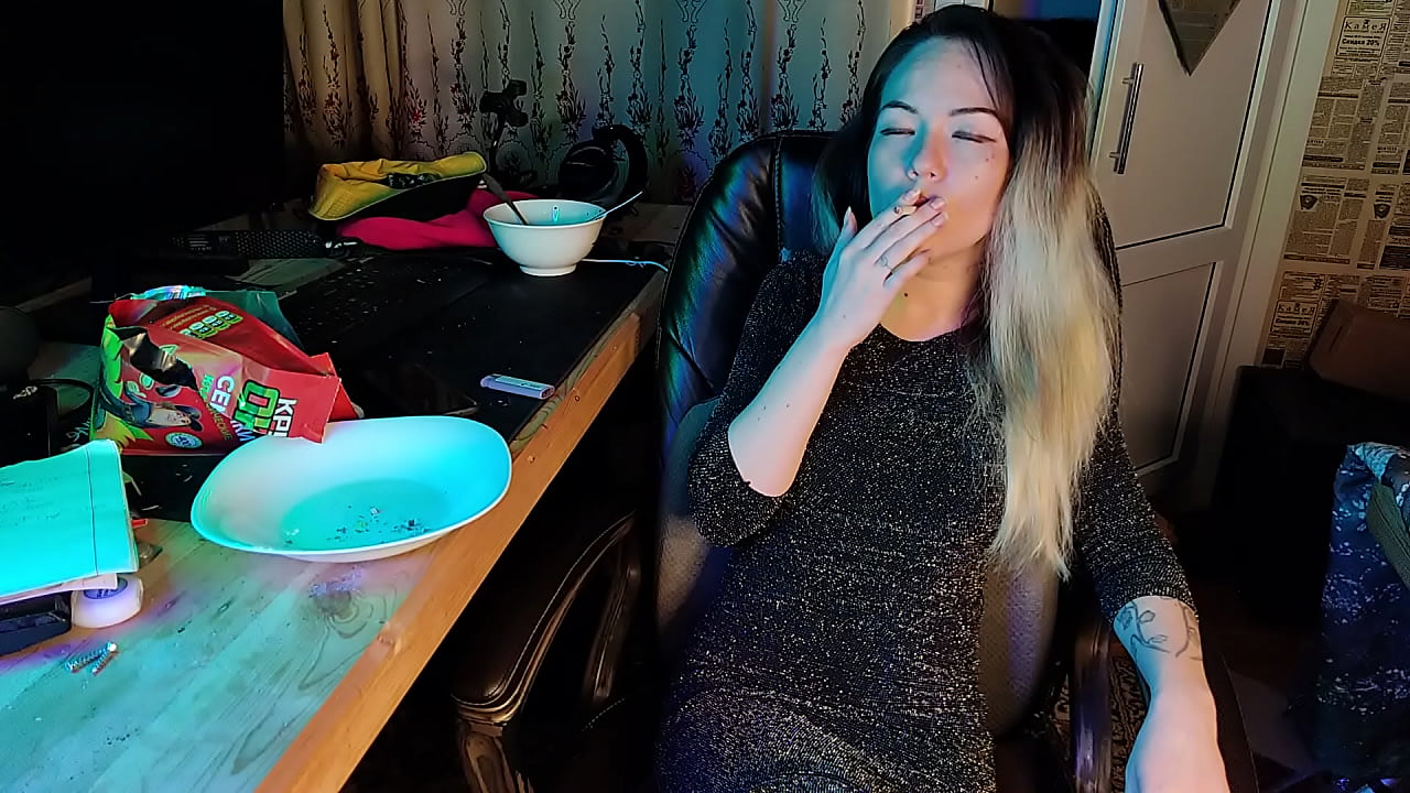 my sexy asian smokes a cigarette