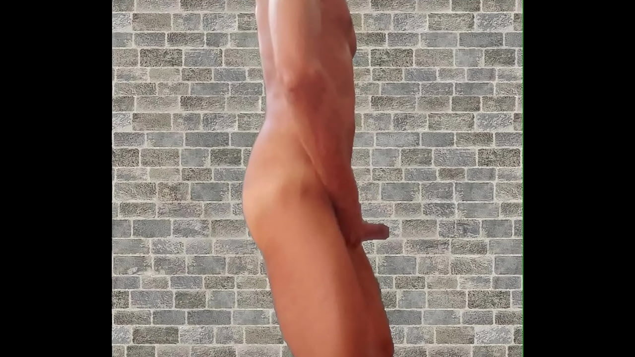 Cock playing and jerking by the brick wall