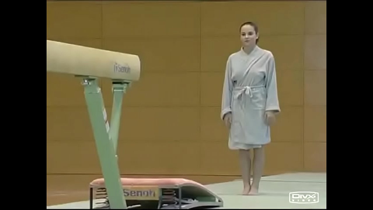 Big titty gymnast does the balance beam