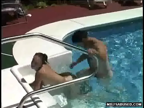 Brunette MILF babe gets fucked by a pool before 69ing