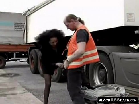 Black hooker riding on mature truck driver outside