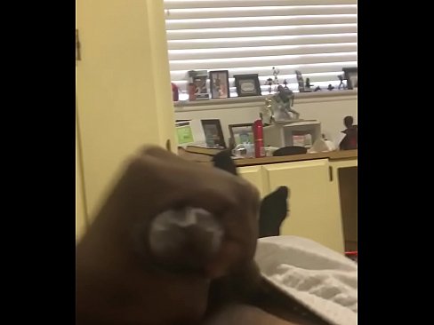 Black man stroking his cock