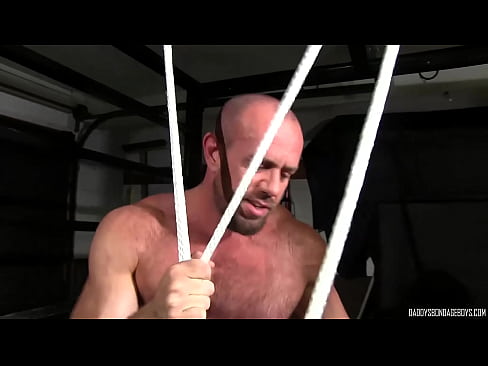 Muscular cop fucks his captive boys ass while tied up and bound
