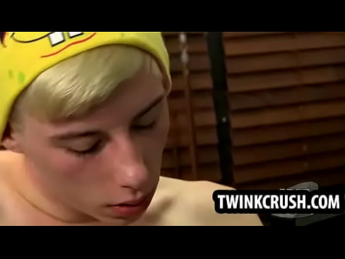 Blonde teen twink gives a blowjob