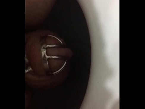 Peeing in chastity cage is not easy. Video report for my mistress.