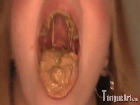 Footpixie shows her open mouth with food mush