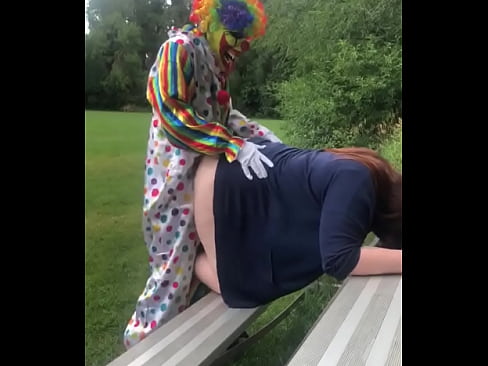 Clown fucks girl in soccer field