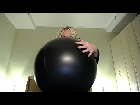 Blow big balloon and pop with long nails