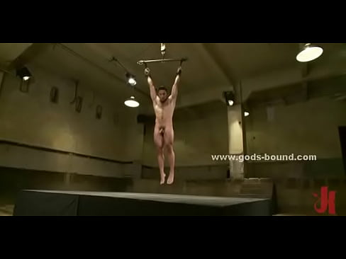 Sexy gay hunk hanged from upper floor