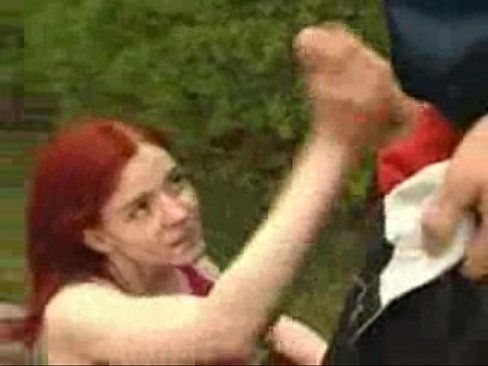 Redhead in Threesome in Park