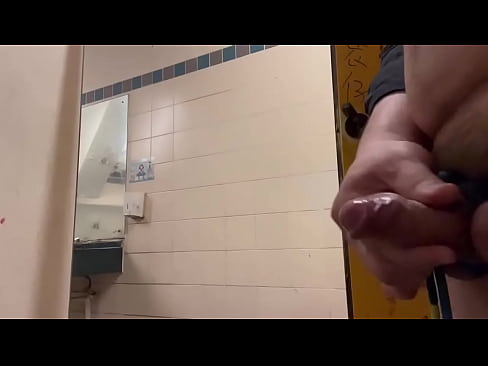 Jerking my tied cock and ball in public toilet
