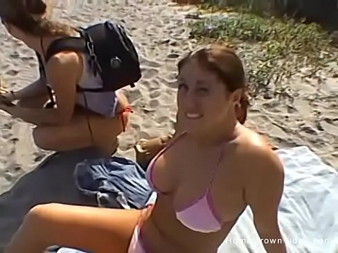 Big tit brunette jerks a cock outdoors