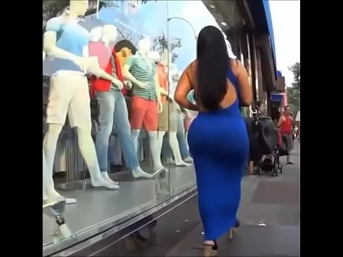 Ebony beauty with gorgeous ass walking on a street