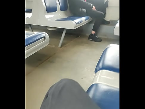 Young guy jerks off in front of another lad in a public train