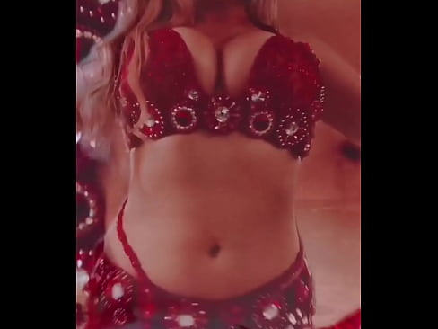 Busty, sexy bellydancer showing off her movements and amazing belly